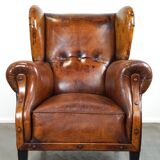 Irresistible old sheep leather wingback armchair with the most beautiful colors