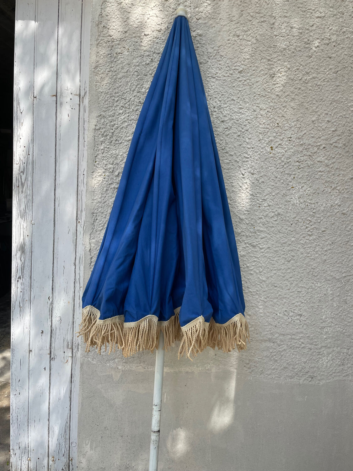 Blue parasol and flowers