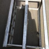 Old bottles in rectangular zinc locker