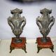2 ancient amphorae in regulation on marble base