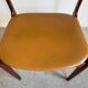 Ensemble de chaises vintage en skaï et palissandre