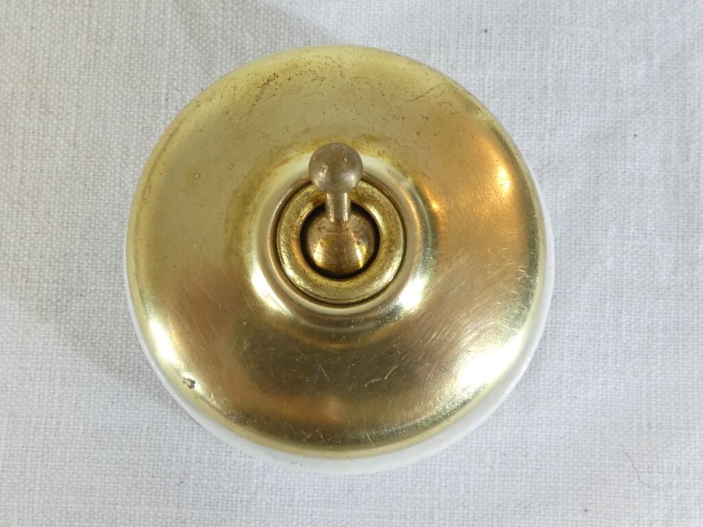 3 Old Porcelain switches and vintage industrial brass