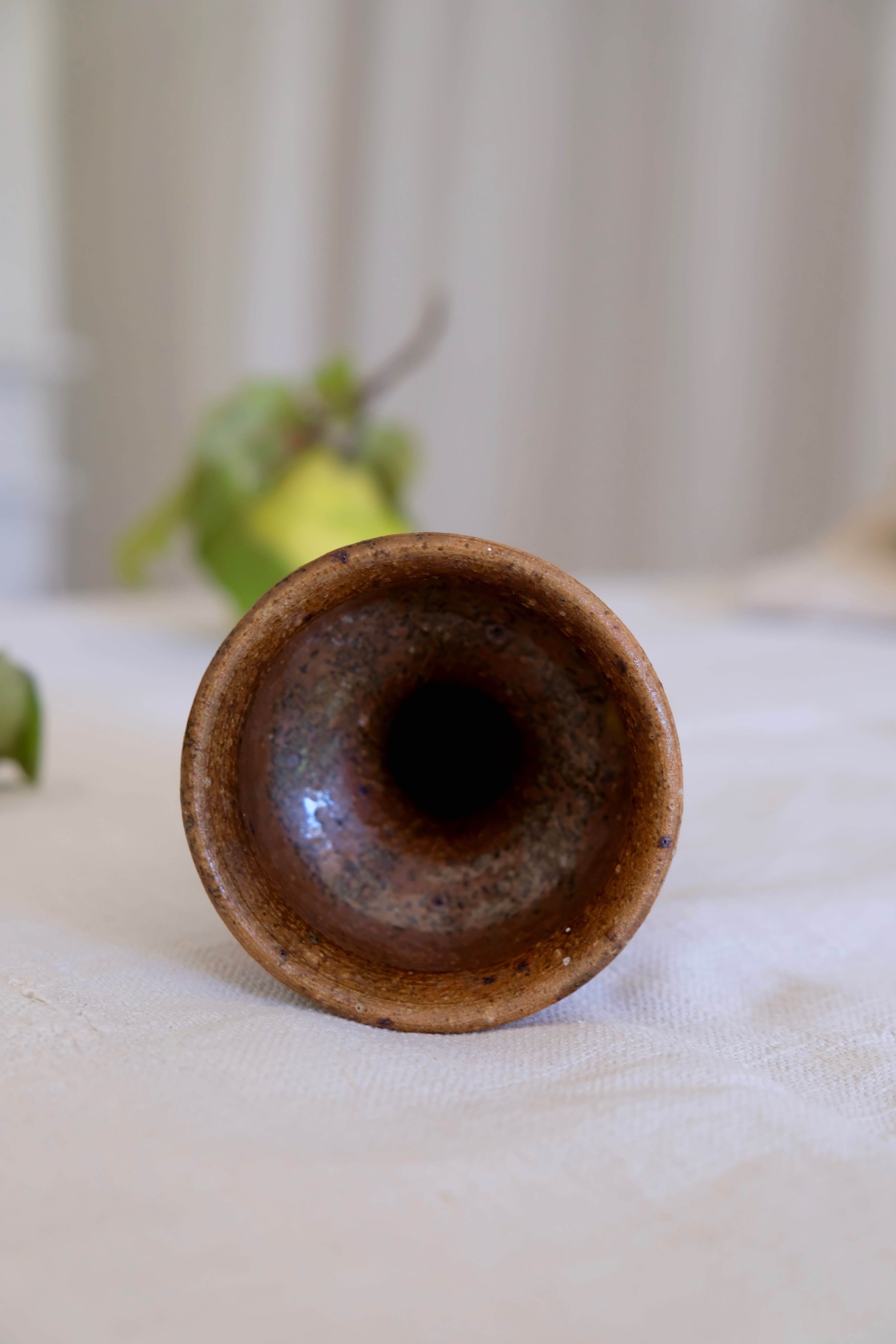 Old sandstone candle holder