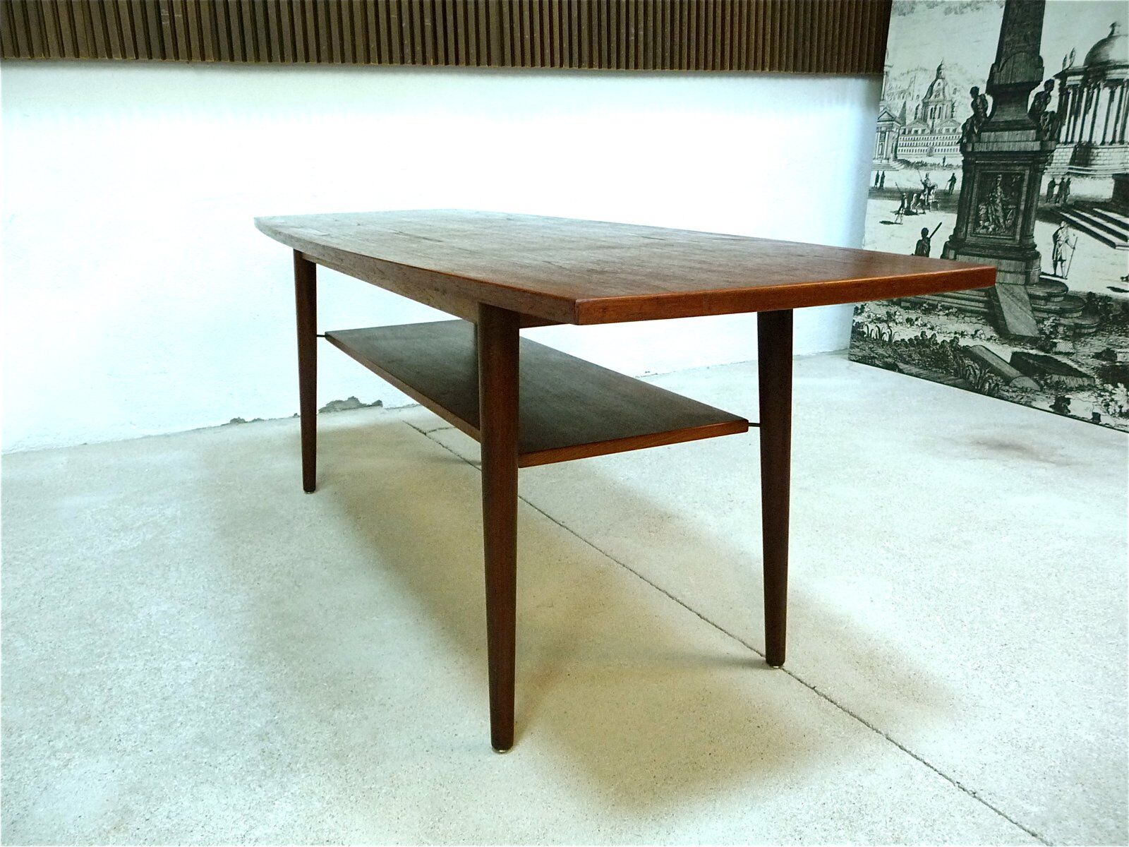 Curved Danish teak coffee table with additional shelf compartment, 1960s