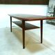 Curved Danish teak coffee table with additional shelf compartment, 1960s