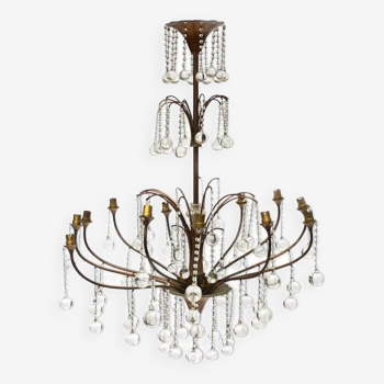 Chandelier in metal and gilded brass decorated with ball tassels