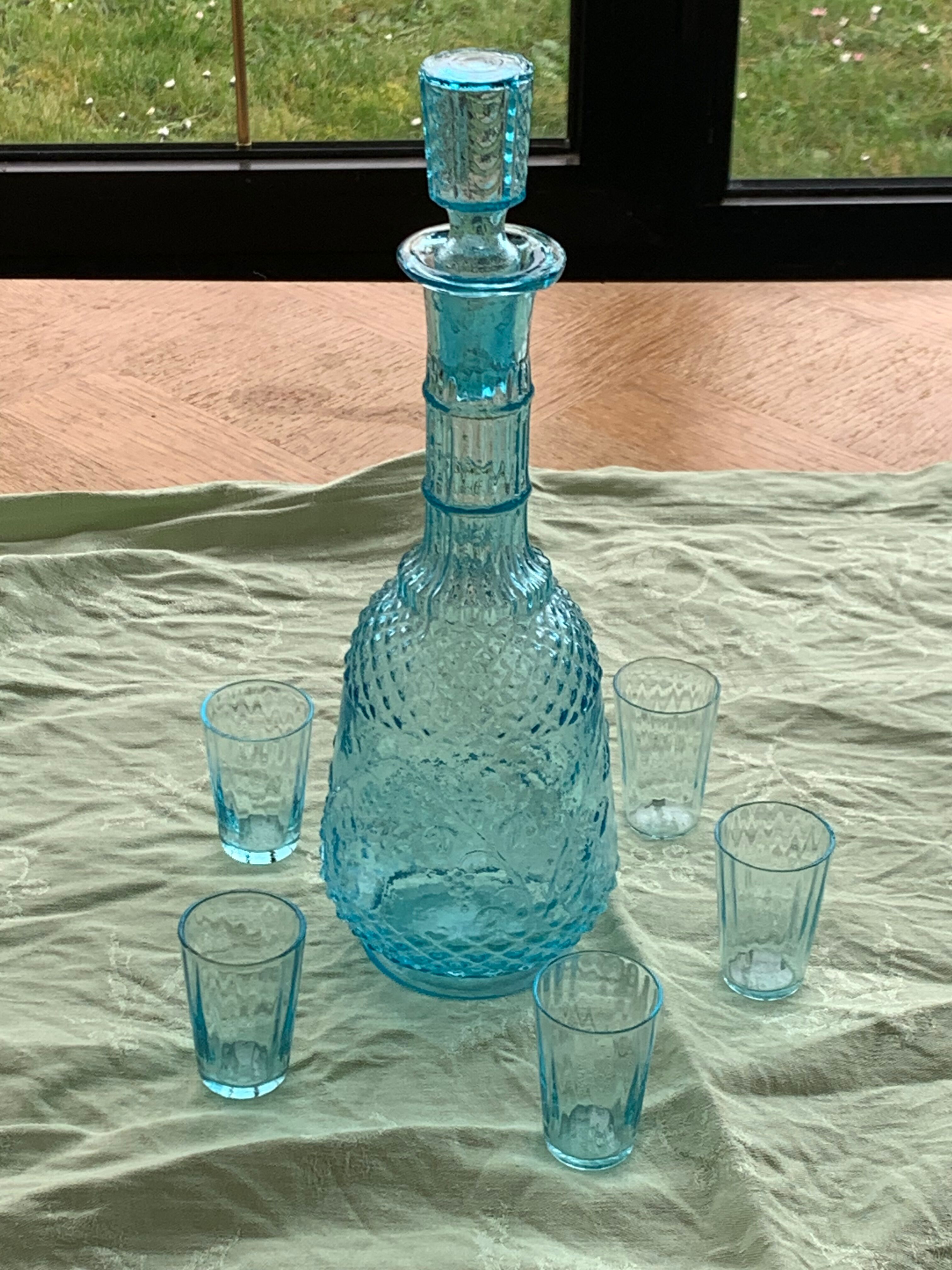 Carafe and 5 old blue glass liqueur glasses