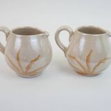 Pair of ceramic milk jugs signed La Roue Vallauris