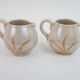 Pair of ceramic milk jugs signed La Roue Vallauris