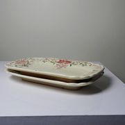 2 antique Longchamp dishes with daisies in polychrome ironstone.