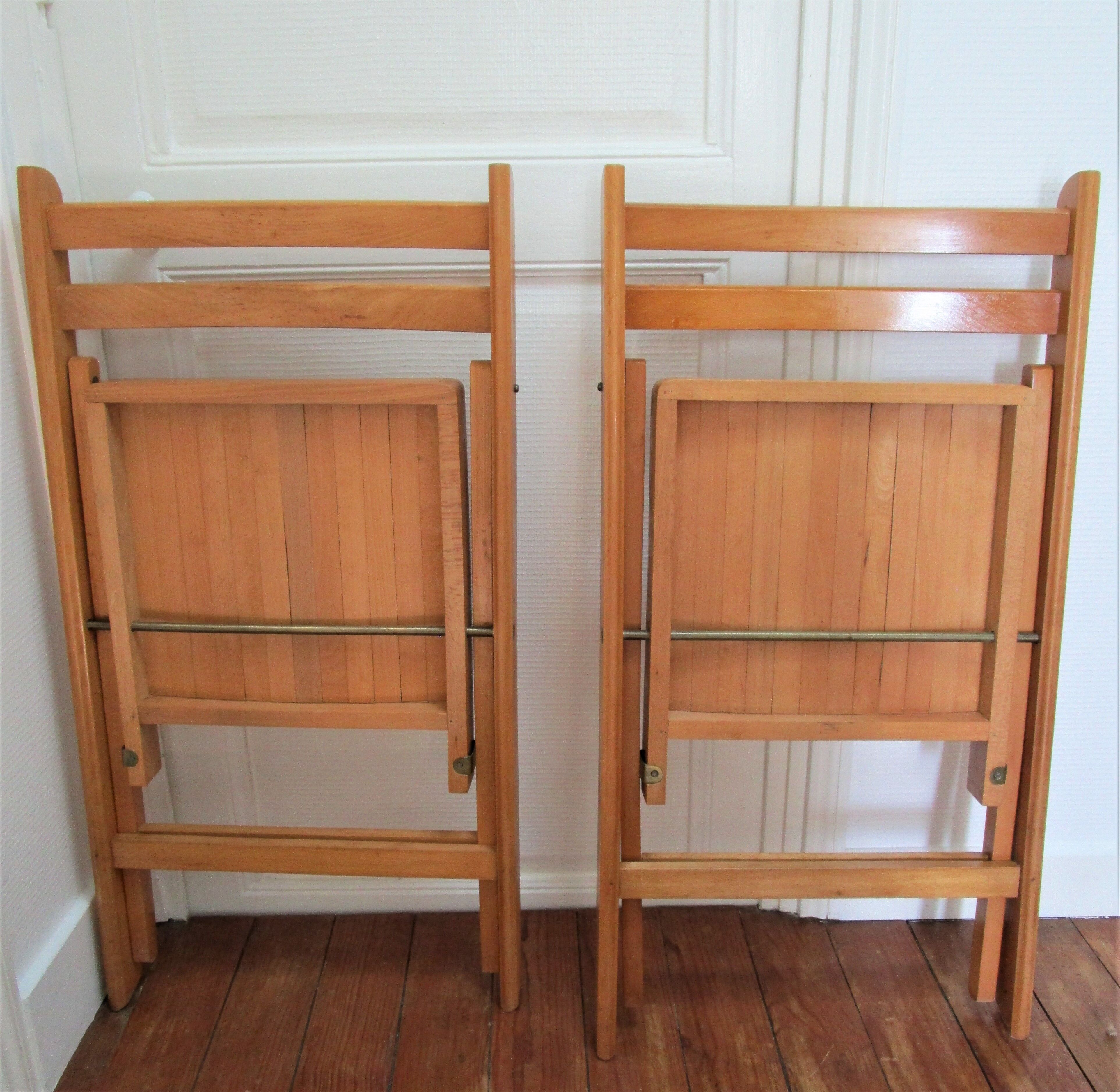 Pair of folding chairs with vintage solid wood slats