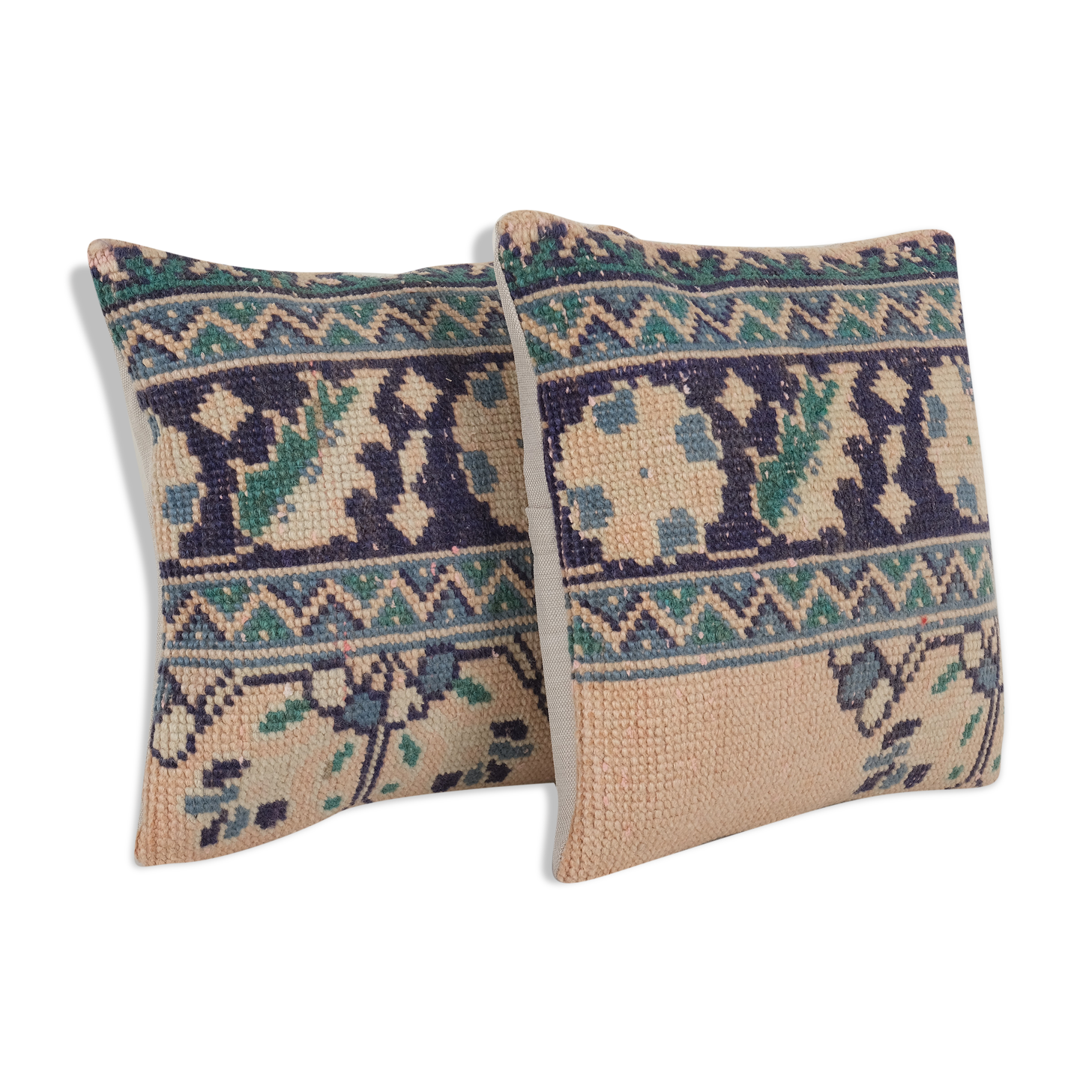 Set of two muted ecru carpet rug pillows