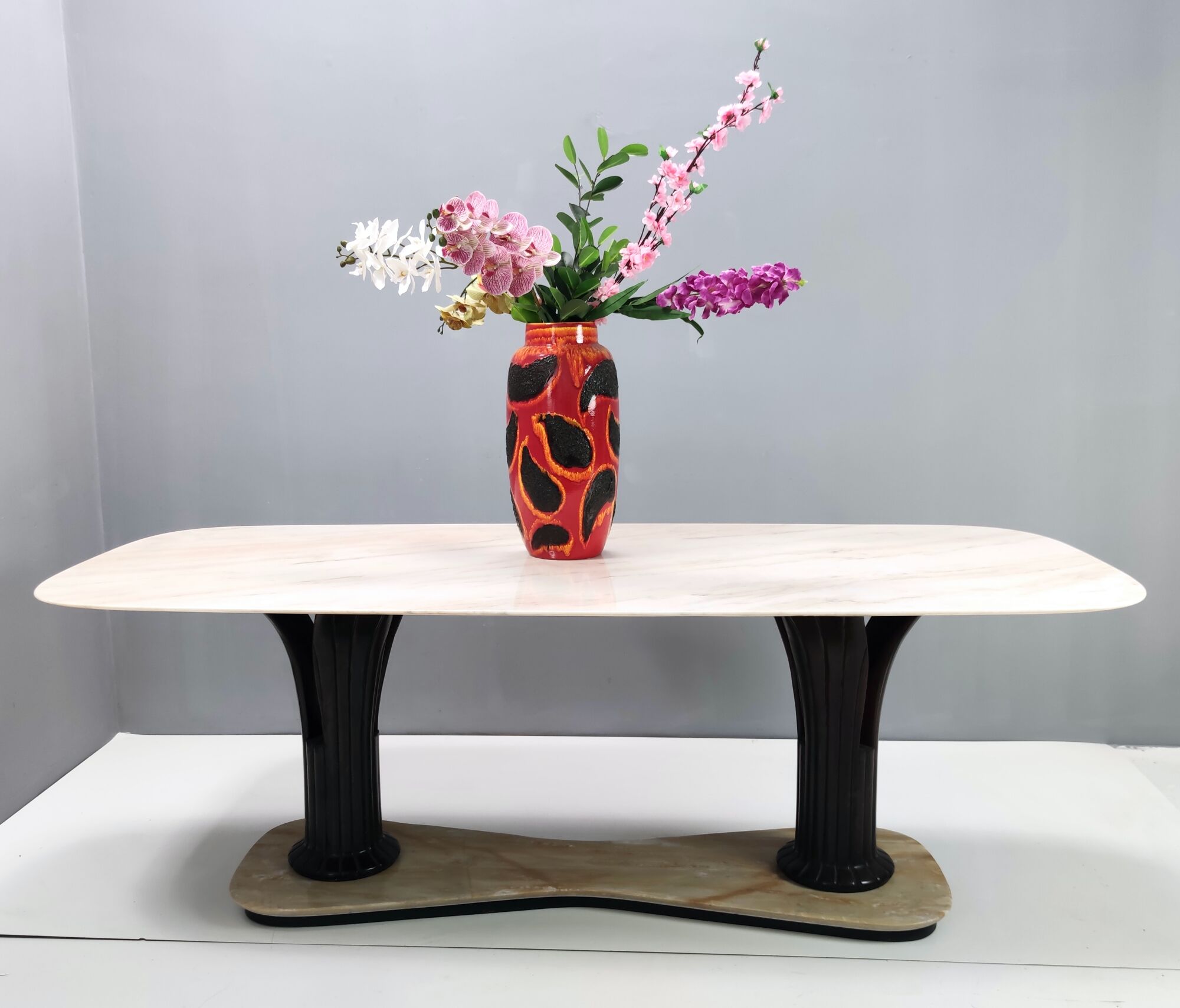 Dining table with a portuguese pink marble top