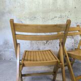 Pair of vintage folding wooden chairs