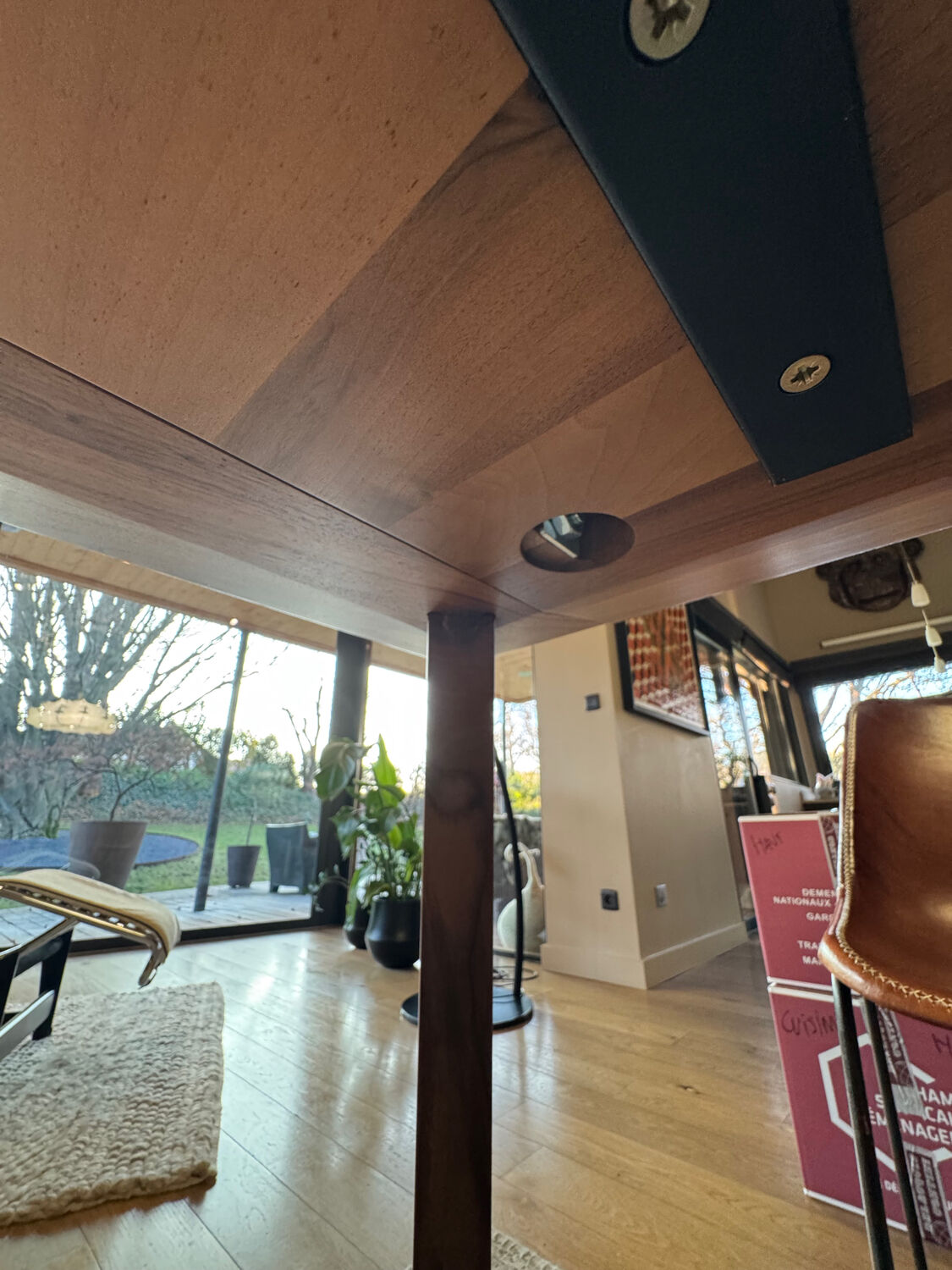 Dining table ligne roset model trapèze in solid walnut with oil finish.