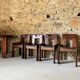 Table and 4 chairs set by Silvio Coppola for Fratelli Montina