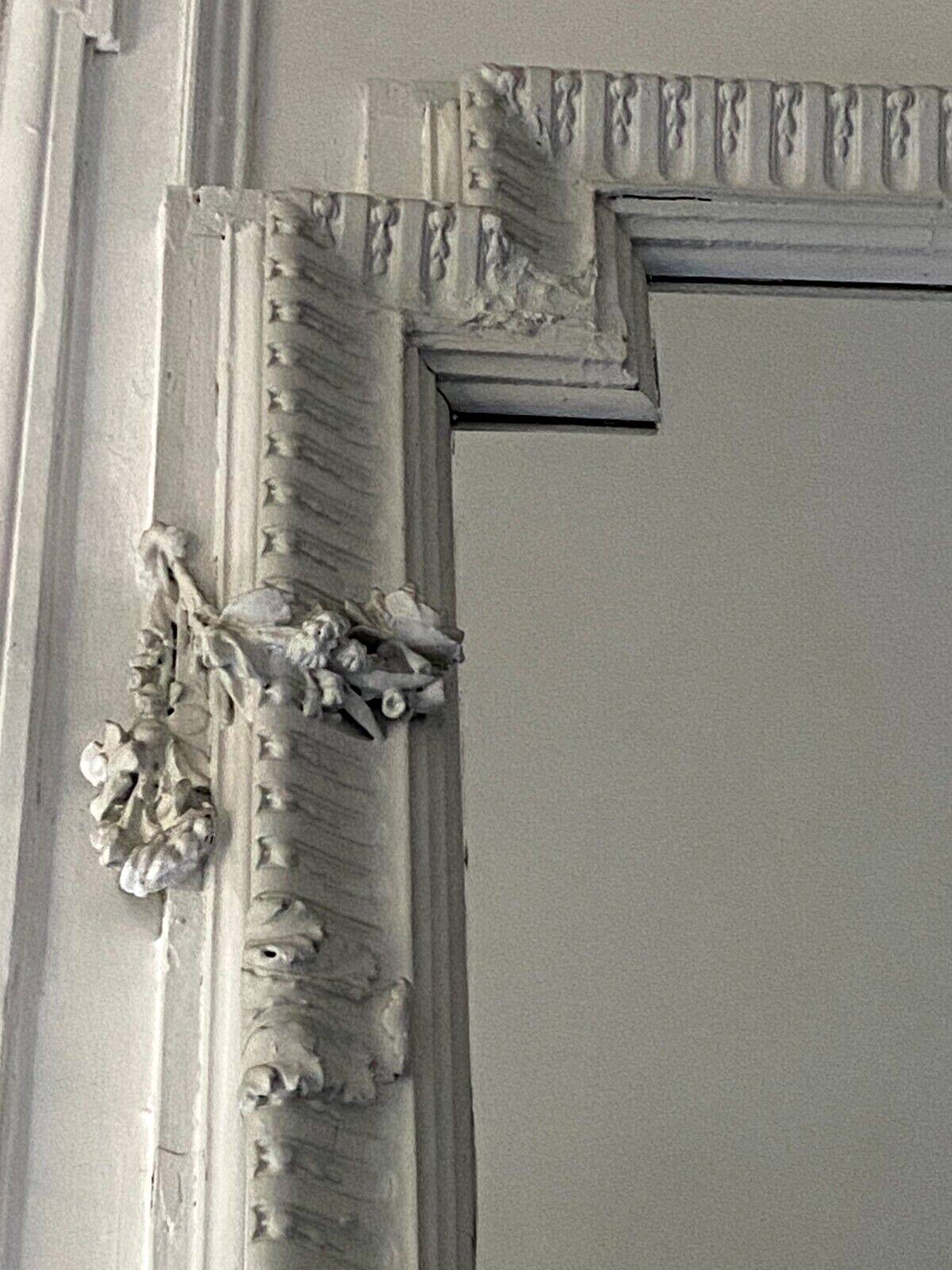 Louis XVI style mirror in wood and carved stucco 20th century