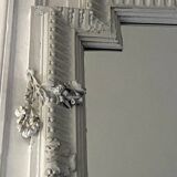 Louis XVI style mirror in wood and carved stucco 20th century