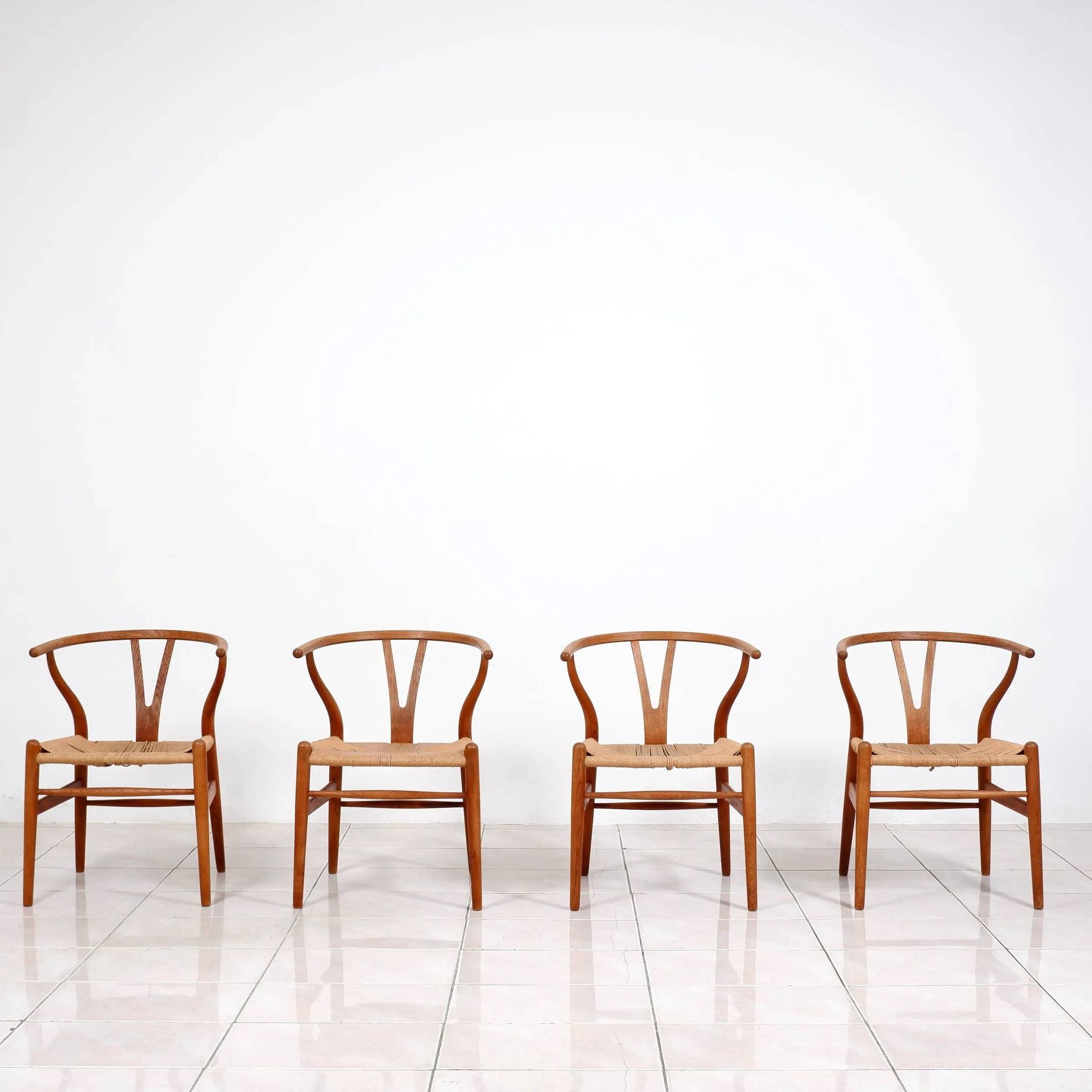 4 "CH24" Wishbone dining chairs by Hans J. Wegner for Carl Hansen & Son