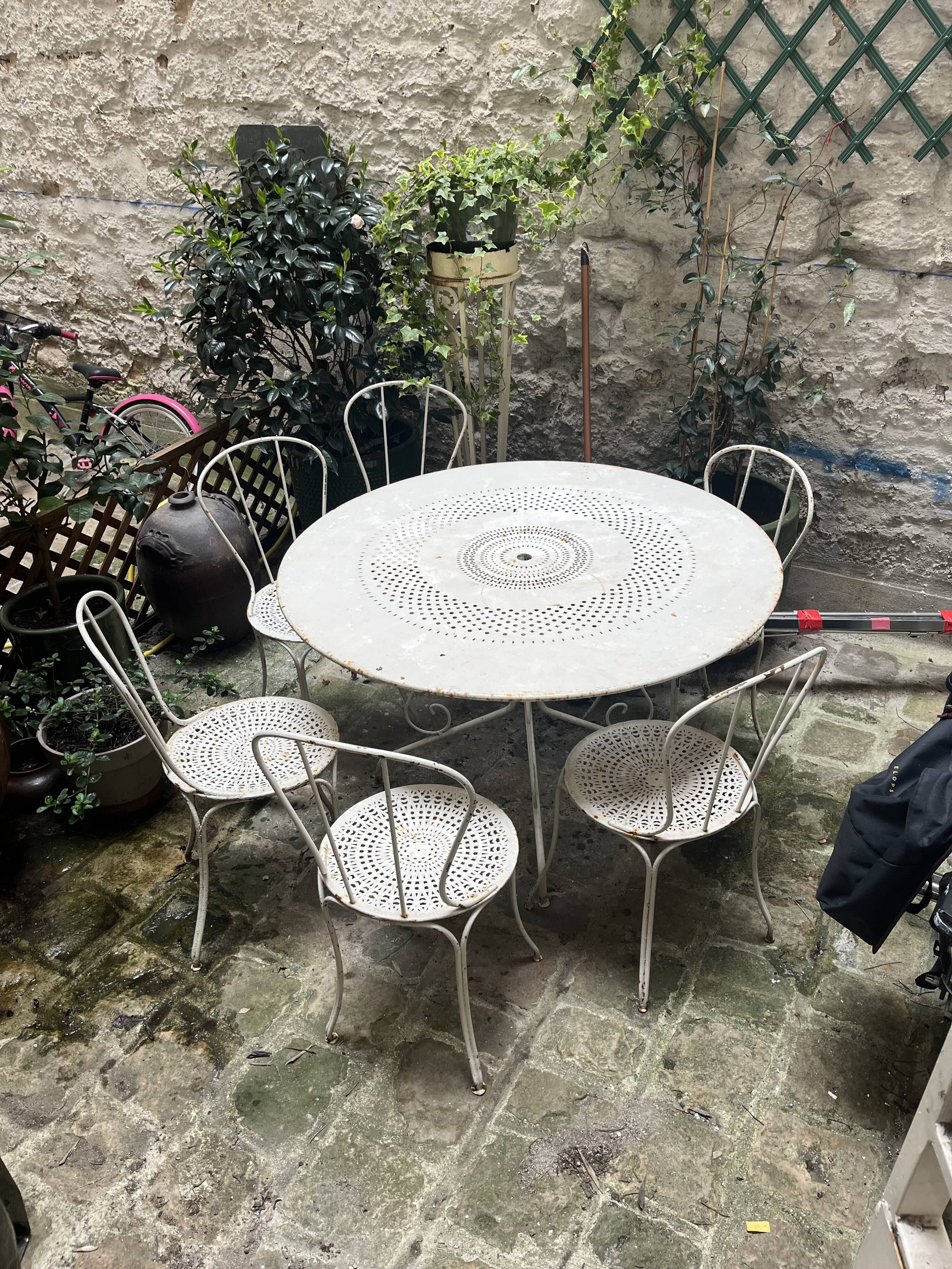 Garden table + 6 antique chairs