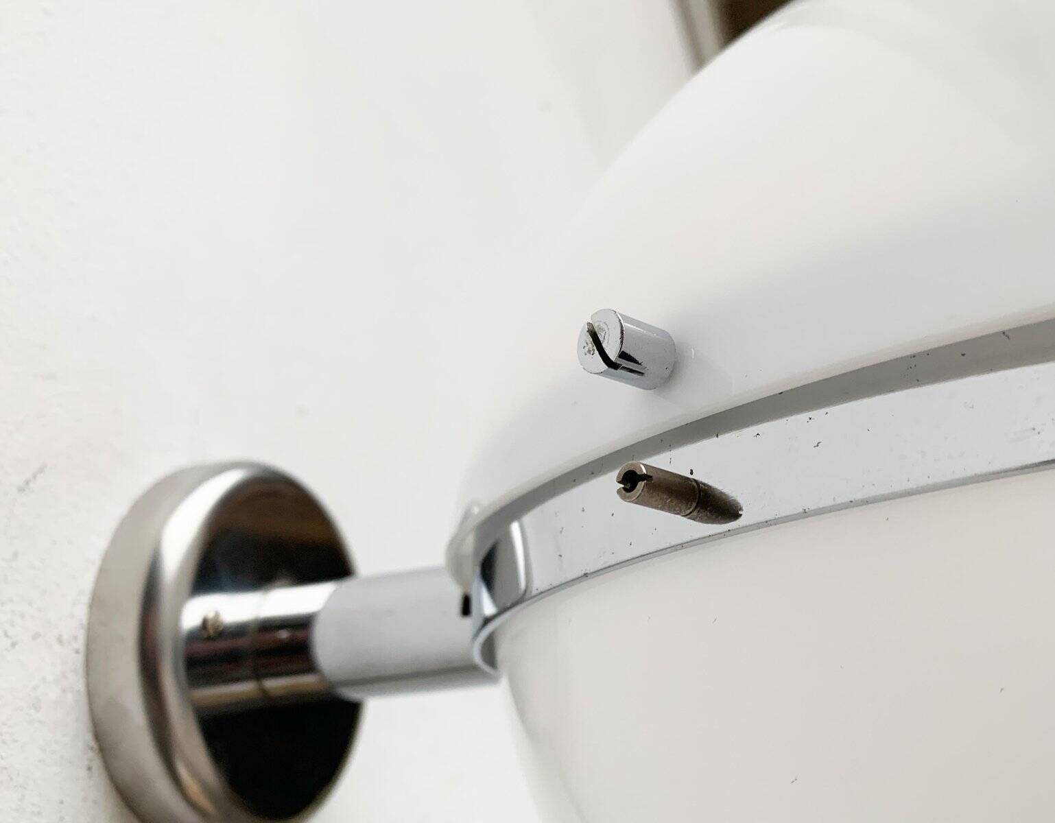 Mid-century Italian space age spherical wall light by Guzzini.