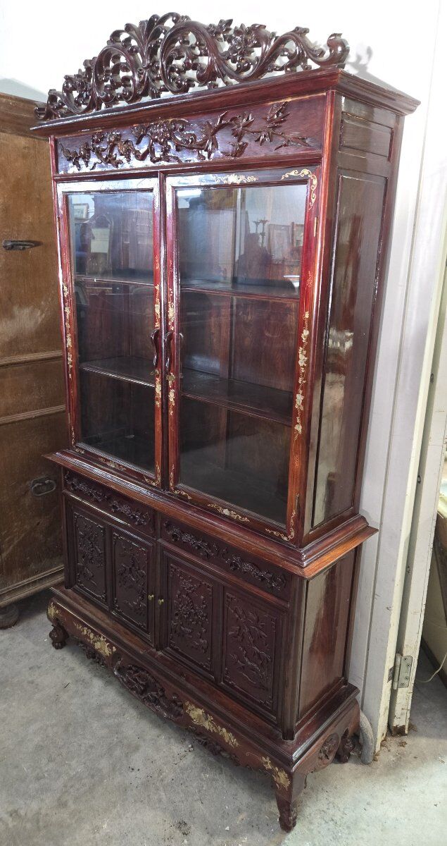 Asia 19th century: Ancient lacquer library, richly carved and adorned.