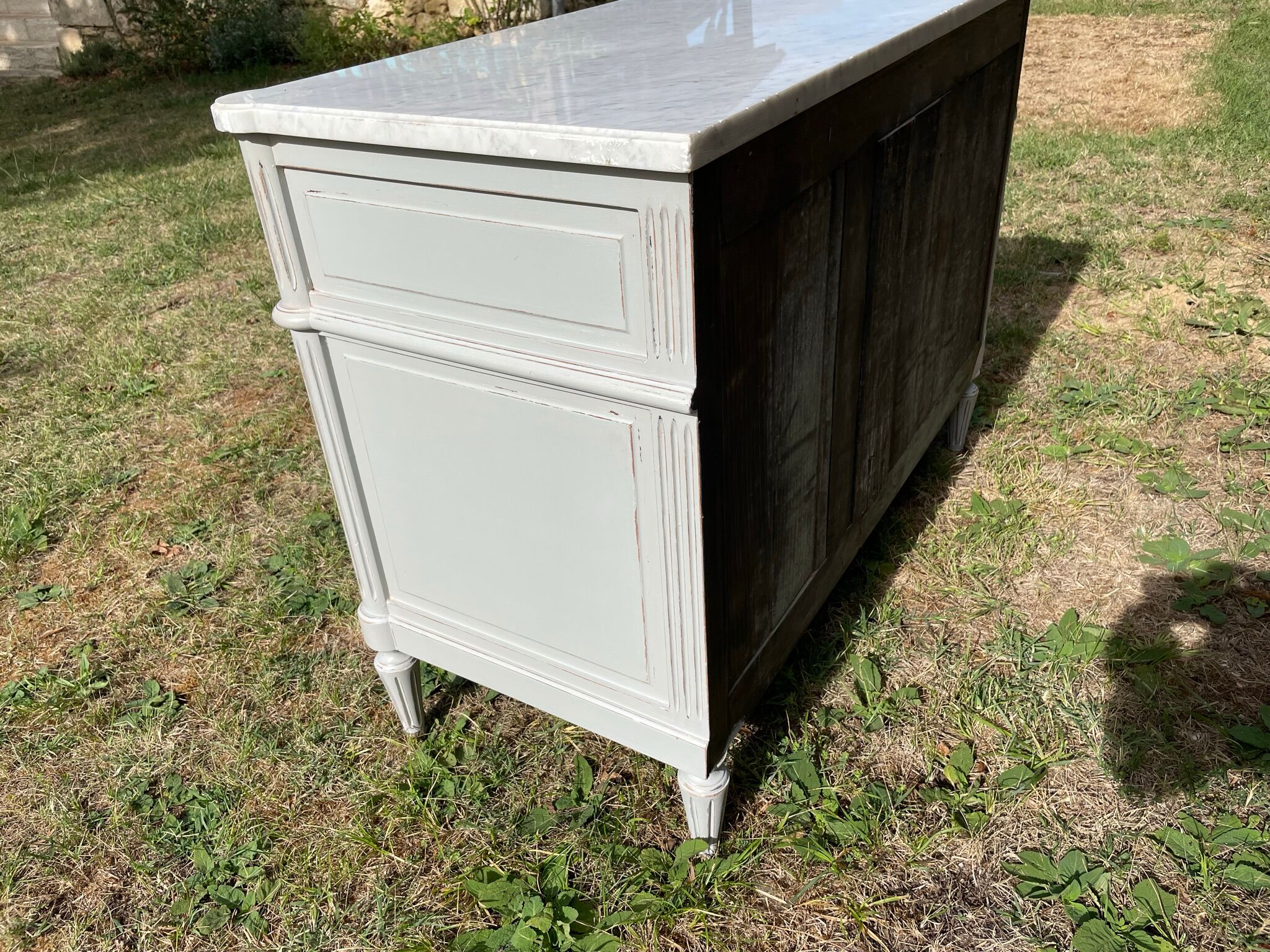 Louis XVI style chest of drawers in versailles grey patinated mahogany with white marble
