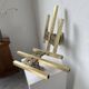 Pair of Regency brass wall lights in Italy