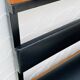 Vintage wall coat rack with storage bench from the 1970s.