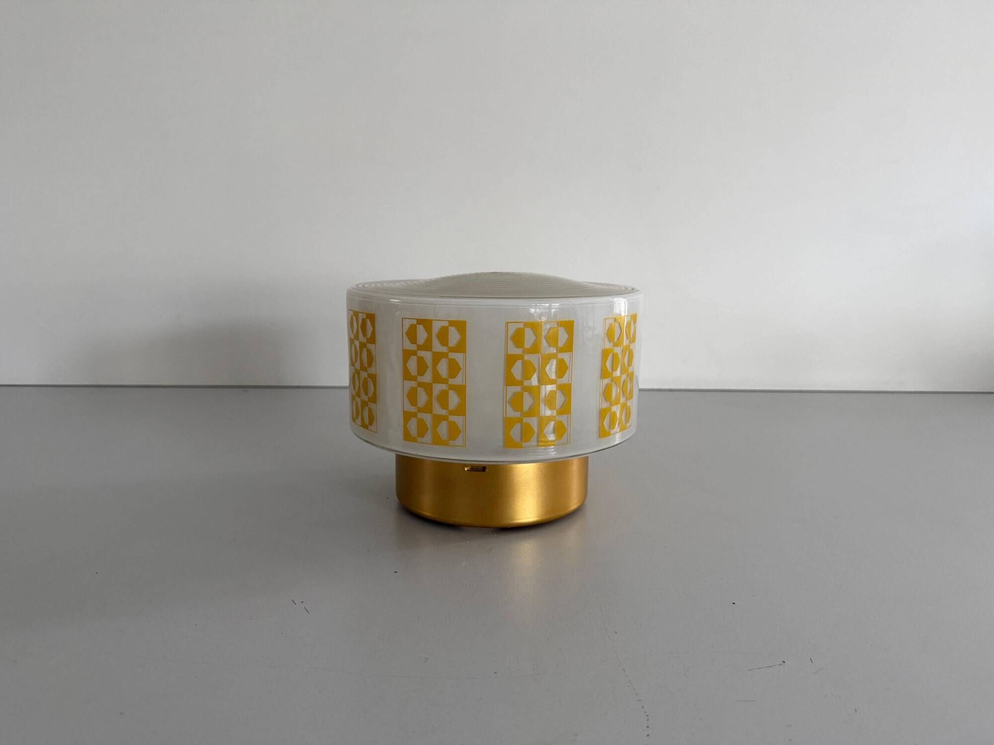 Ceiling light or wall sconce in opal glass with yellow decorations by VEB, 1950s, Germany.