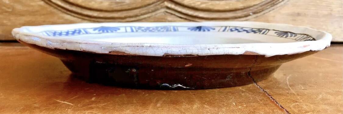 Old round hollow dish XVIII black bottom Rouen Forges les eaux