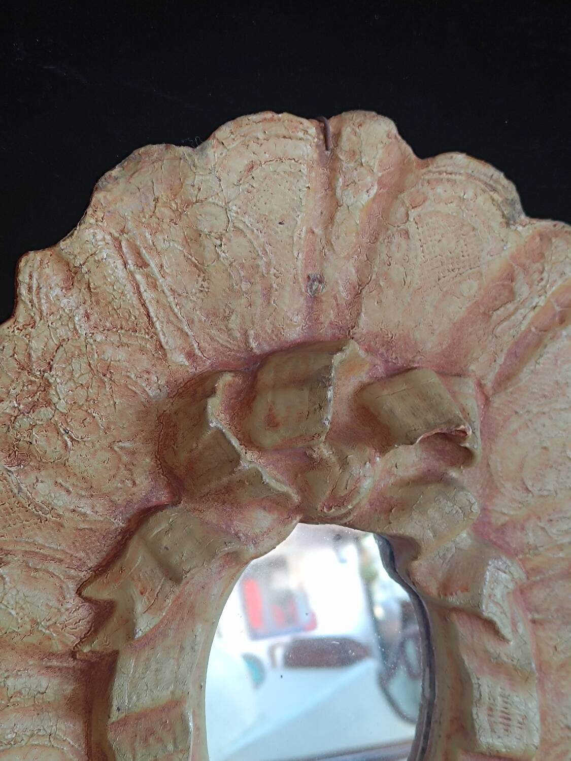 Painted oval plaster mirror