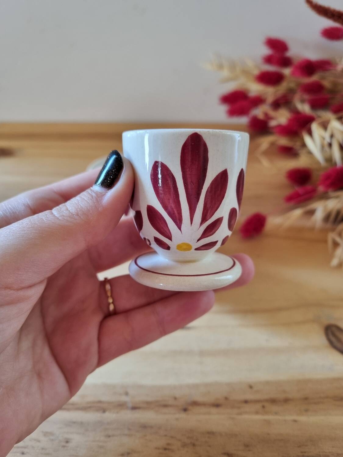 Set of four Digoin-style egg cups