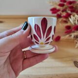 Set of four Digoin-style egg cups