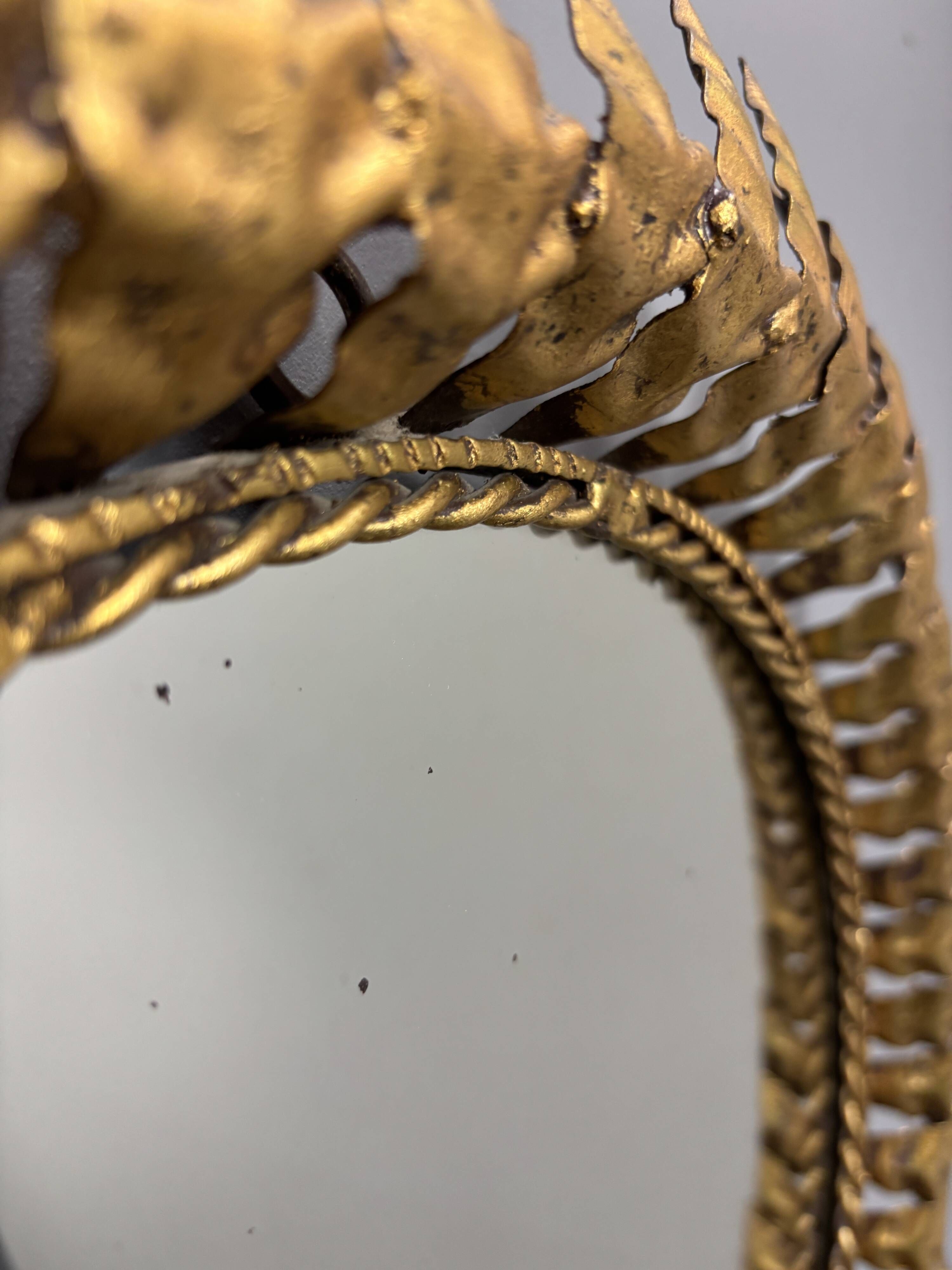 Midcentury bohemian Hollywood Regency Spanish gilt metal sun mirror, 1960s