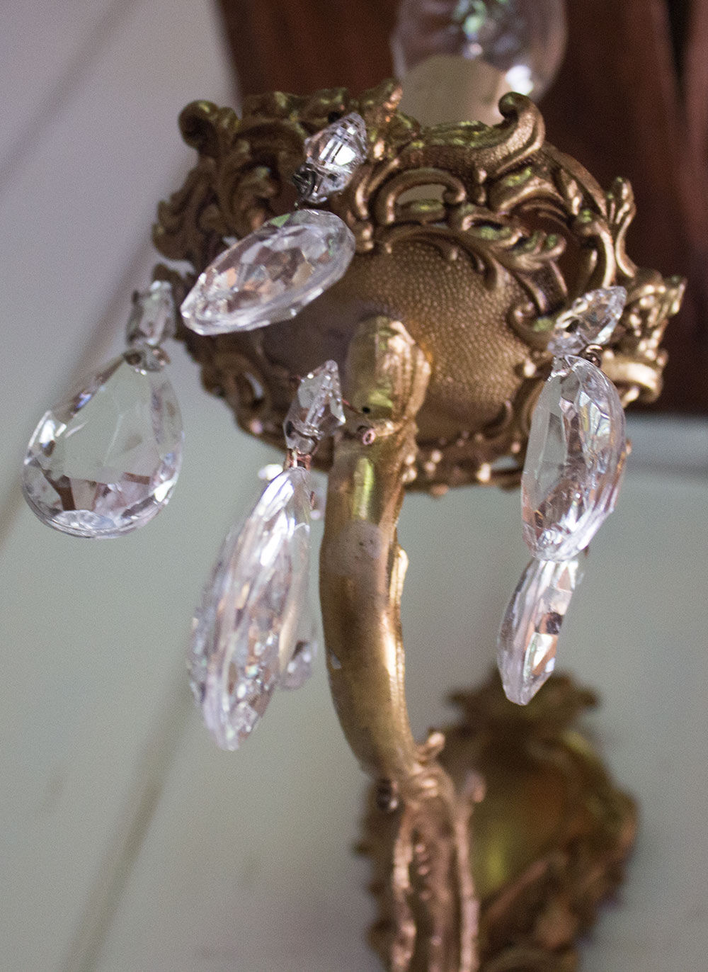Old brass wall light with glass stamps