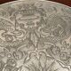 Silvered metal table mat