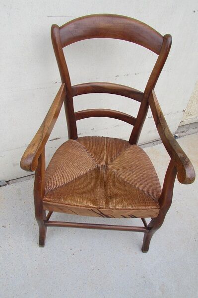 Rustic straw armchair in walnut