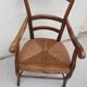 Fauteuil rustique paillé en noyer