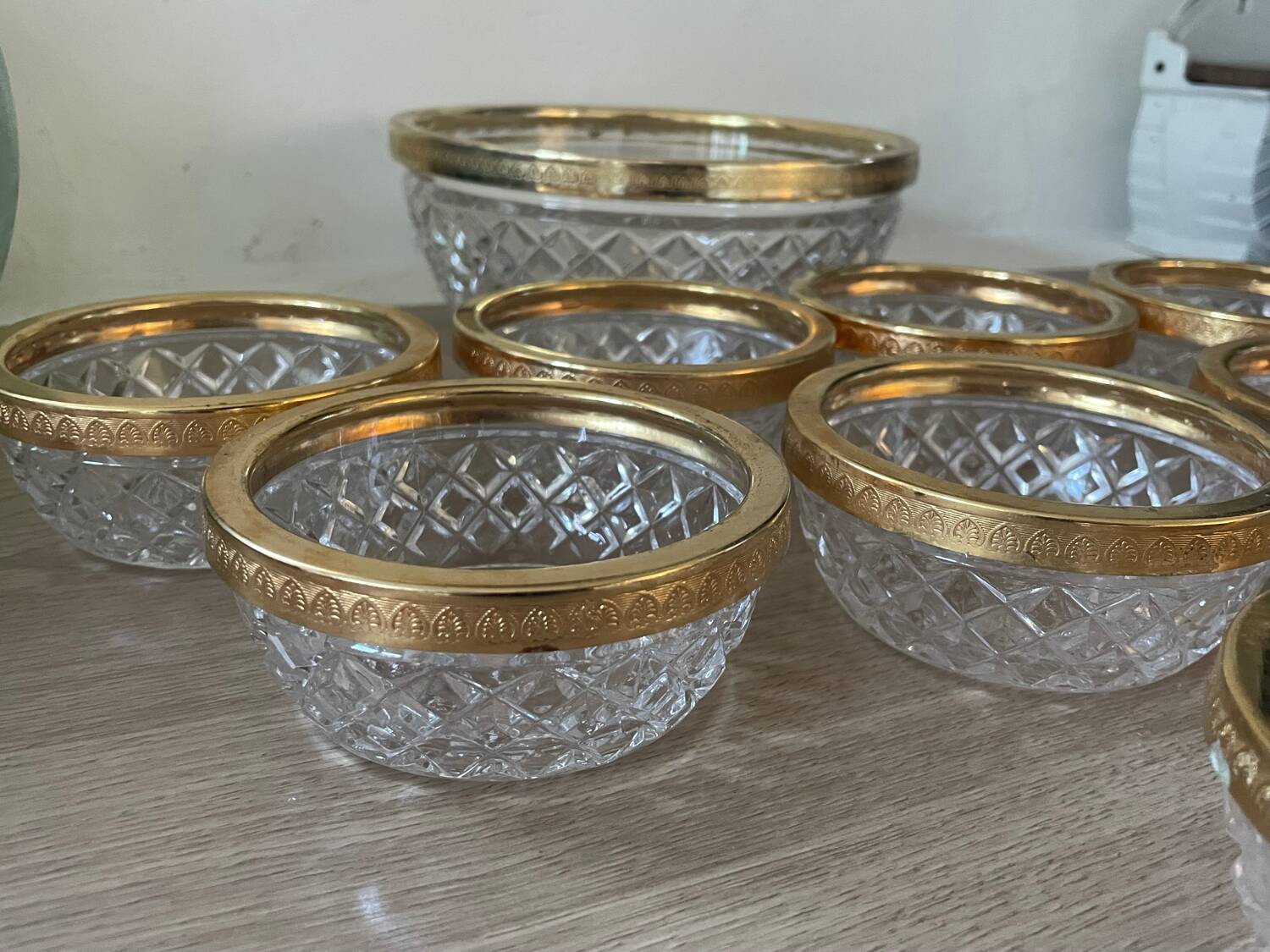 Salad bowl and cups in cut glass and brass