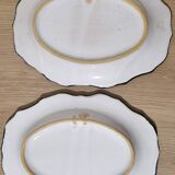 Pair of oval dishes in hand-painted faience with an Italian majolica spirit.