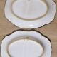 Pair of oval dishes in hand-painted faience with an Italian majolica spirit.