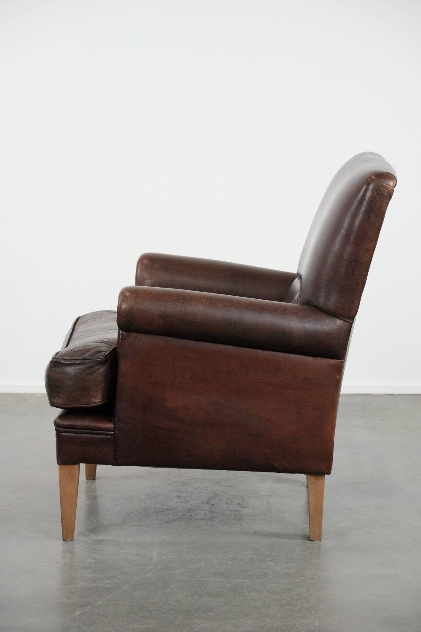 Beautiful Characterful Sheep Leather Armchair with a Deep Colour