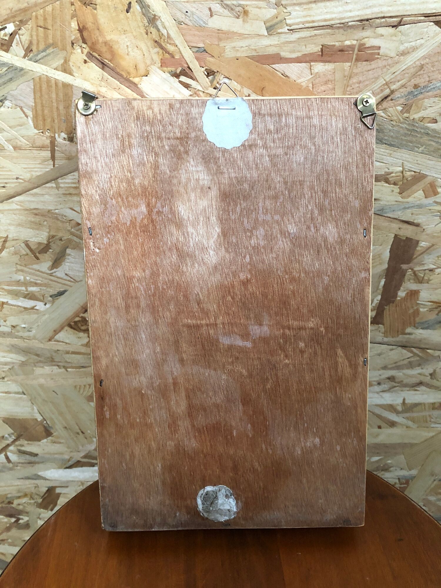 Old hanging display case with 15 wooden boxes, red background + vintage glass door