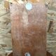 Old hanging display case with 15 wooden boxes, red background + vintage glass door