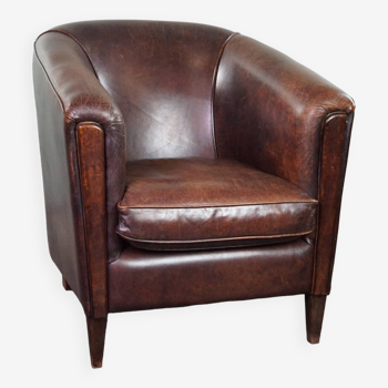 Dark sheep leather club armchair, sleek design