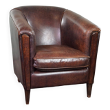 Dark sheep leather club armchair, sleek design