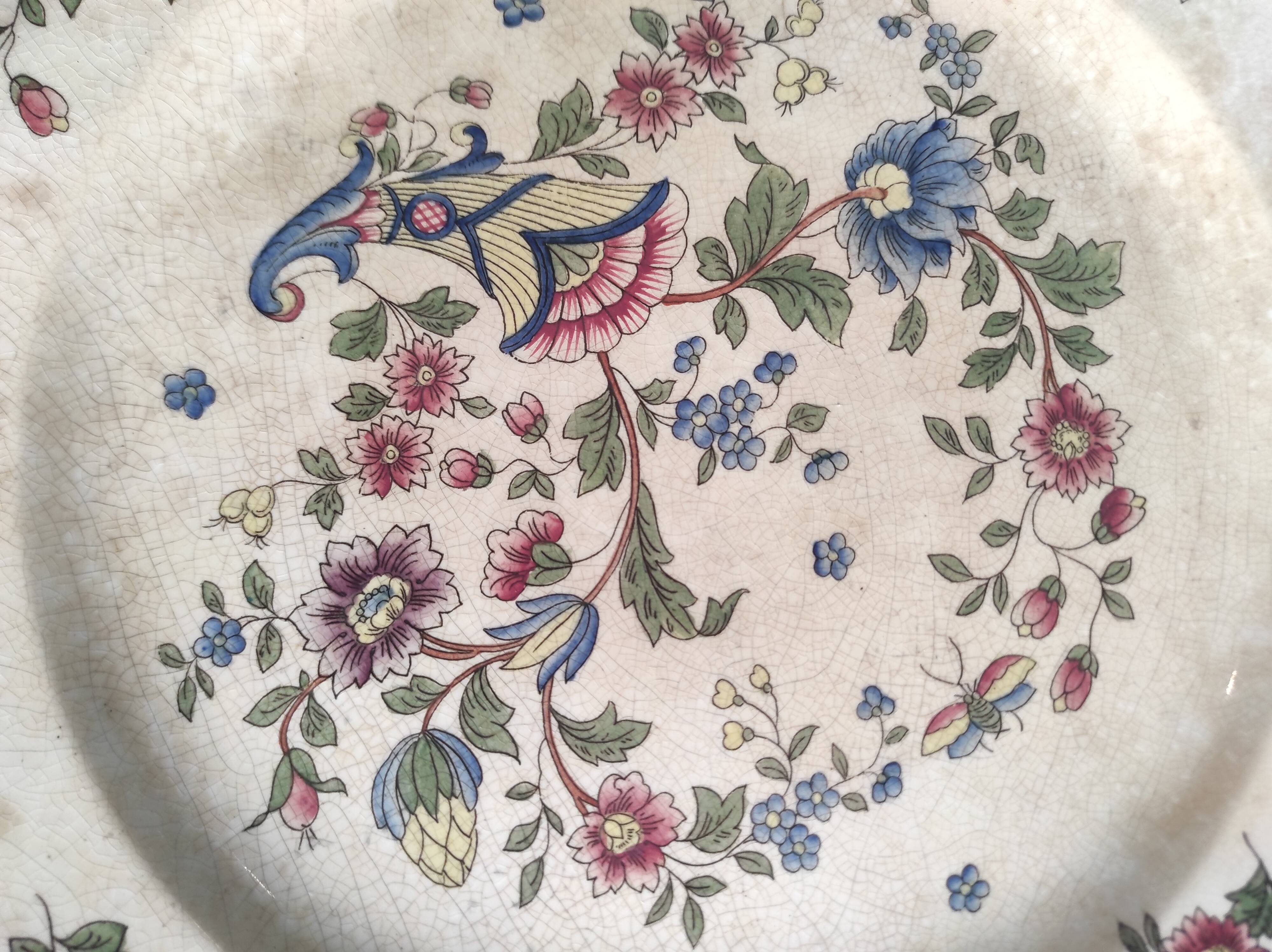 Vintage French round serving plate faience de Rouen, representing a horn of plenty