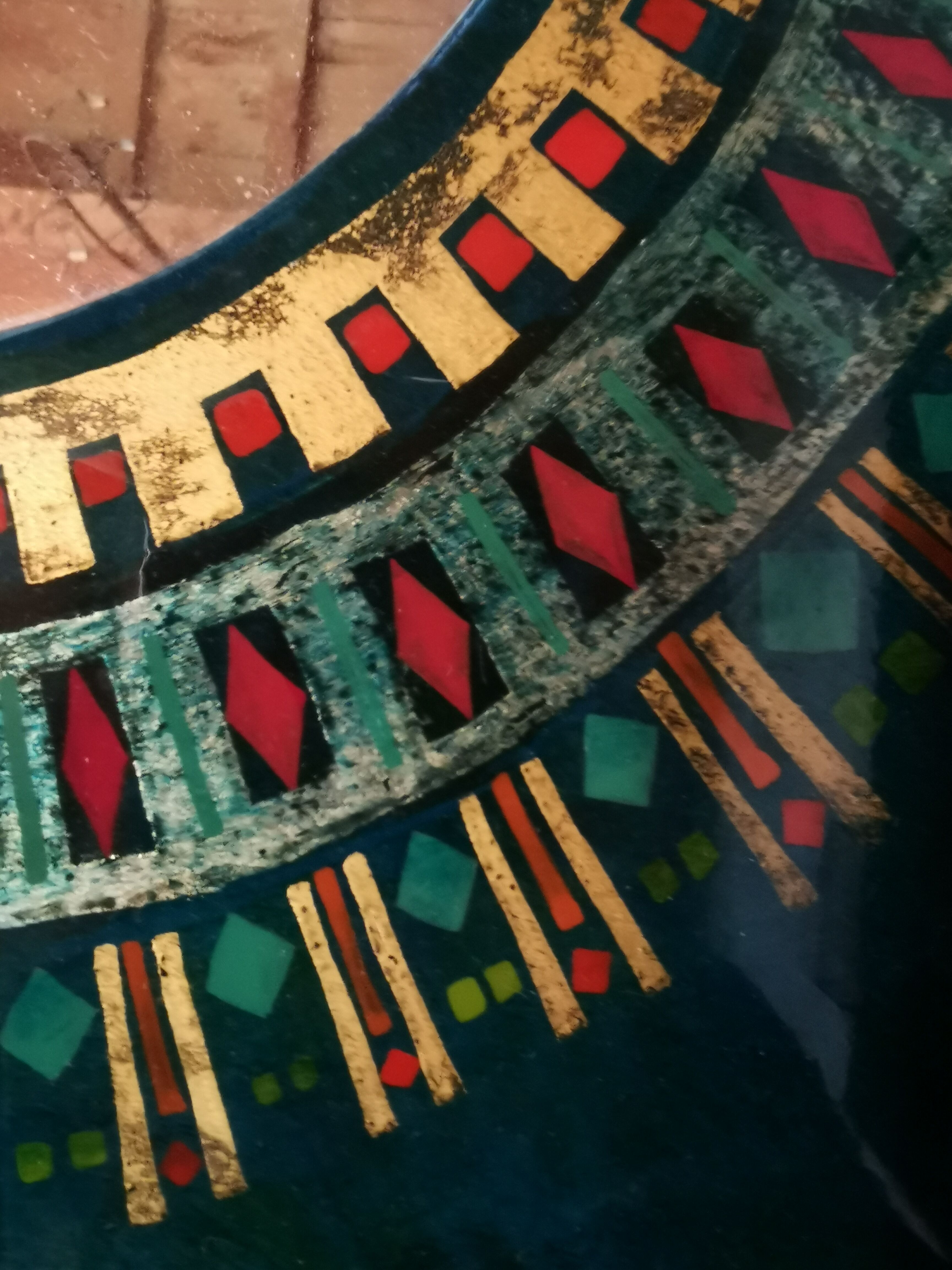 Green and gold laque mirror signed Clémence