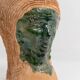 Vintage ceramic vase from the 1980s, sculptural head shape with a green glazed face, terracotta art object.